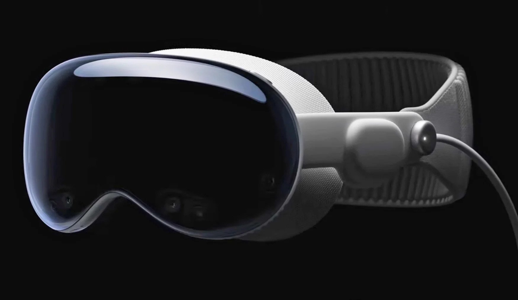 Vision Pro headset has the form of ski goggles connected to an external battery pack via cable